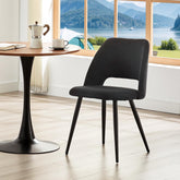 Black velvet upholstered dining chairs,independent metal legs.