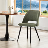 Green velvet upholstered dining chairs,independent metal legs.