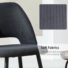 Black velvet upholstered dining chairs,independent metal legs.