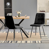 Black upholstered dining chairs,high back and Dutch velvet, metal base.