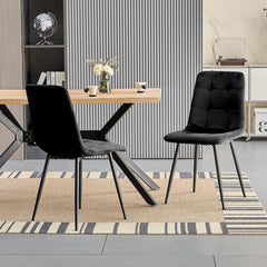 Black upholstered dining chairs,high back and Dutch velvet, metal base.